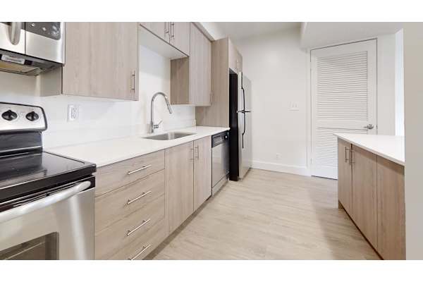 Kitchen With Custom Cabinetry at Avia Lofts at Maple Road, Amherst, NY, New York